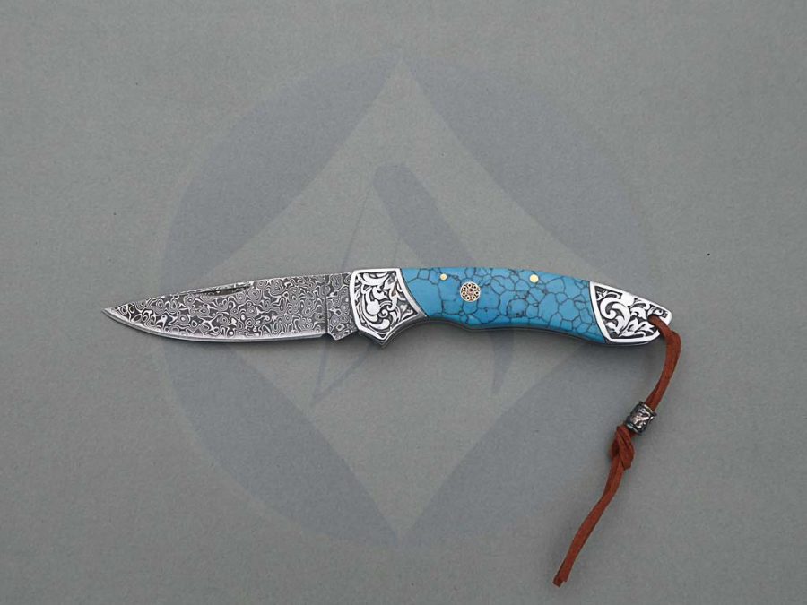 navaja-acero-damasco-albainox-resina-azul.jpg