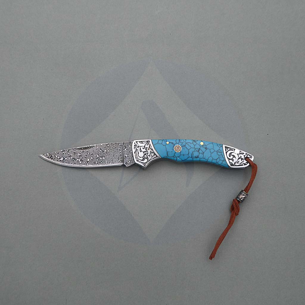 navaja-acero-damasco-albainox-resina-azul.jpg